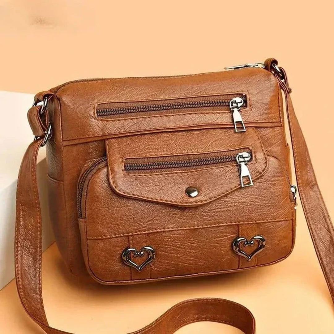 Vintage Shoulder Bag with Adjustable Strap and Secure Closure - Image 1